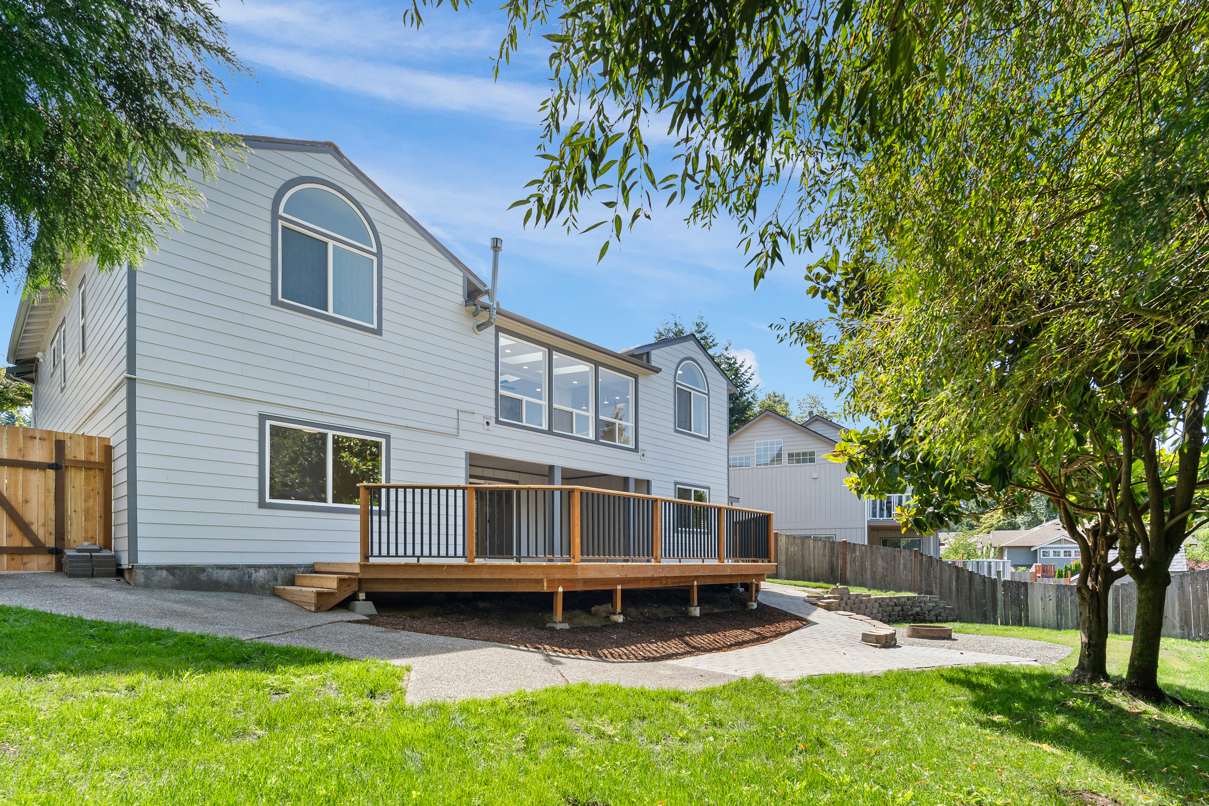 Backyard wood deck built during an exterior remodel